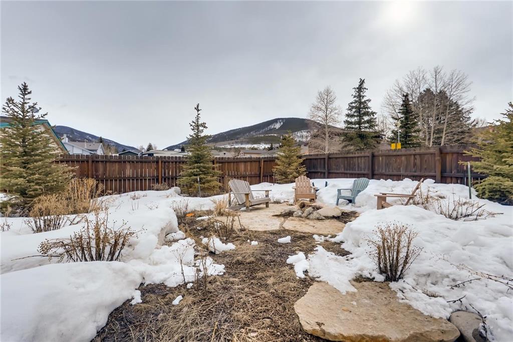 82 Canyon Trail Road Dillon, CO 80435 - Photo 17 of 31 a view of roof deck with dining table and chairs