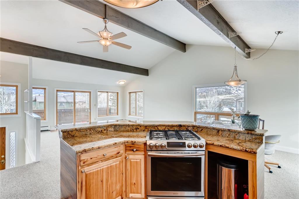 82 Canyon Trail Road Dillon, CO 80435 - Photo 23 of 31 a kitchen with a stove and a sink