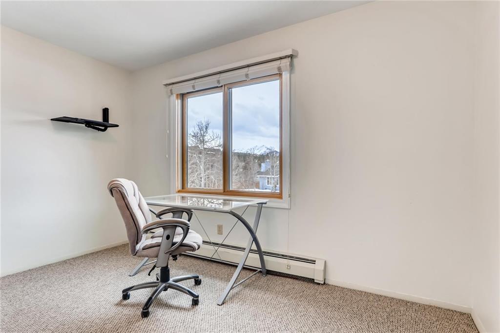 82 Canyon Trail Road Dillon, CO 80435 - Photo 25 of 31 a view of a workspace with furniture and a window