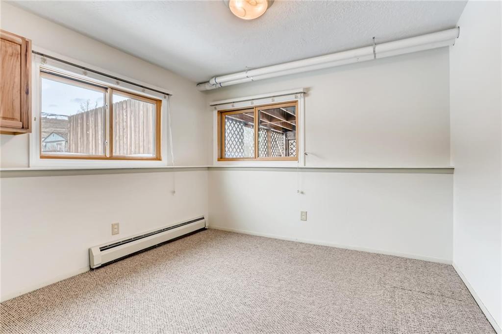 82 Canyon Trail Road Dillon, CO 80435 - Photo 27 of 31 a view of an empty room with a window