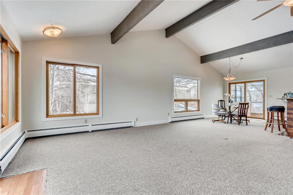 82 Canyon Trail Road Dillon, CO 80435 - Photo 5 of 31 an empty room with furniture and a window