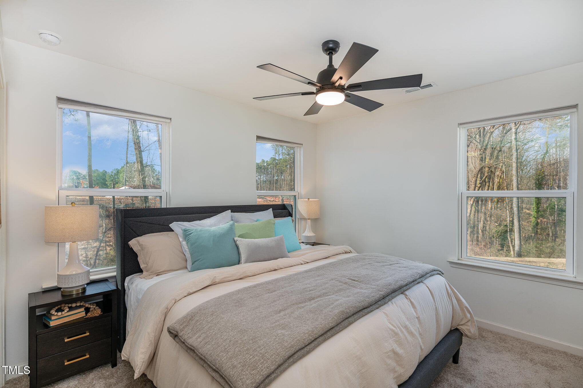 3110 Crater Loop Raleigh, NC 27610 - Photo 19 of 38 a bedroom with a large bed and a window