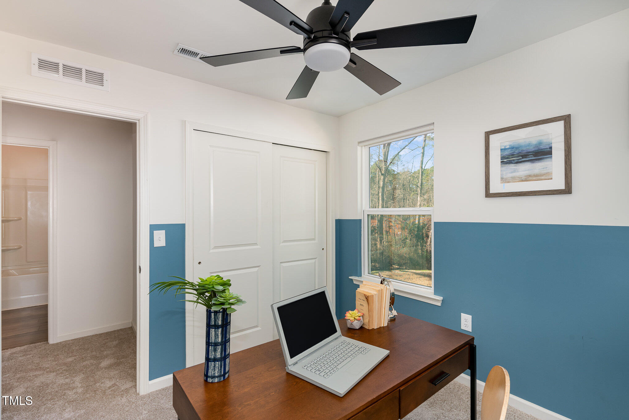 3110 Crater Loop Raleigh, NC 27610 - Photo 27 of 38 a view of a workspace with furniture