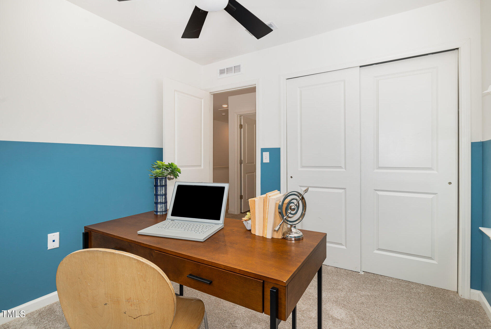 3110 Crater Loop Raleigh, NC 27610 - Photo 28 of 38 a view of a workspace with furniture