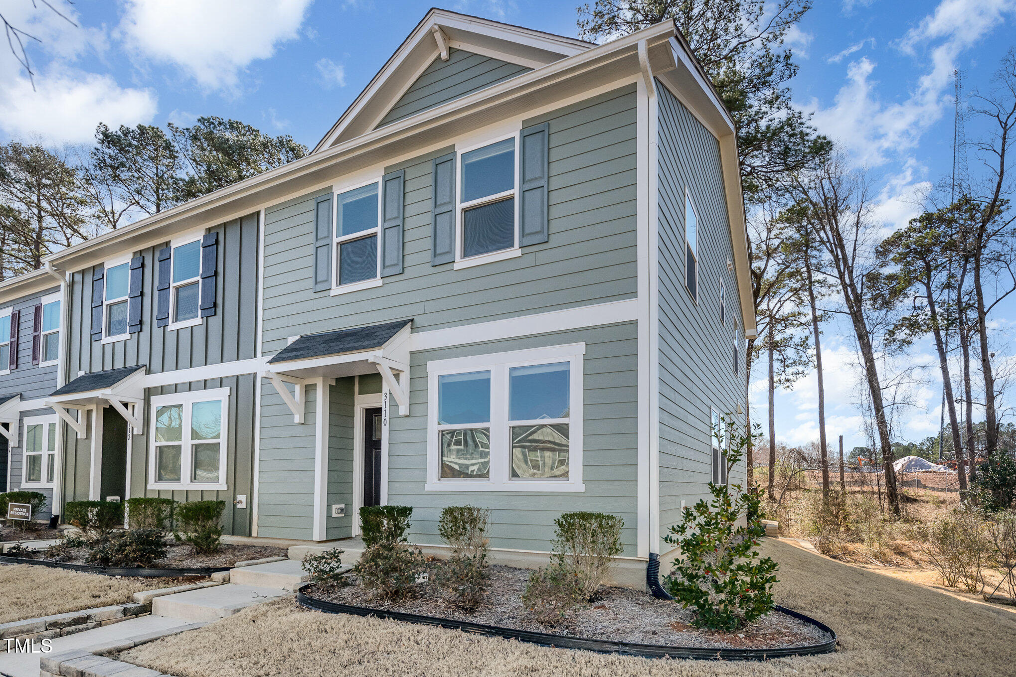 3110 Crater Loop Raleigh, NC 27610 - Photo 3 of 38 a front view of a house with garden