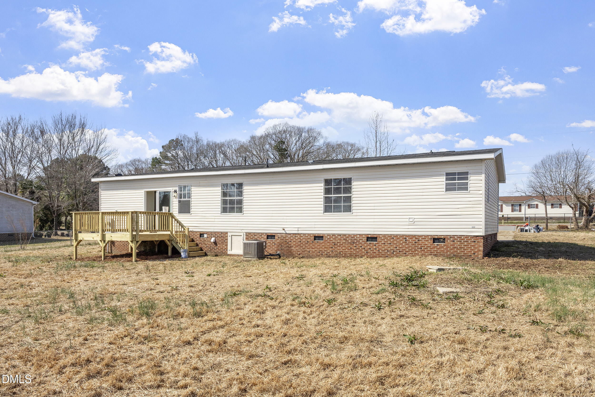 10965 Beaver Dam Road Middlesex, NC 27557 - Photo 18 of 24 a front view of a house with a yard