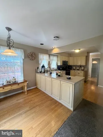 a kitchen with counter top space and appliances