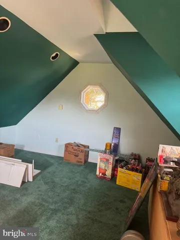 a room with furniture and a wooden floor