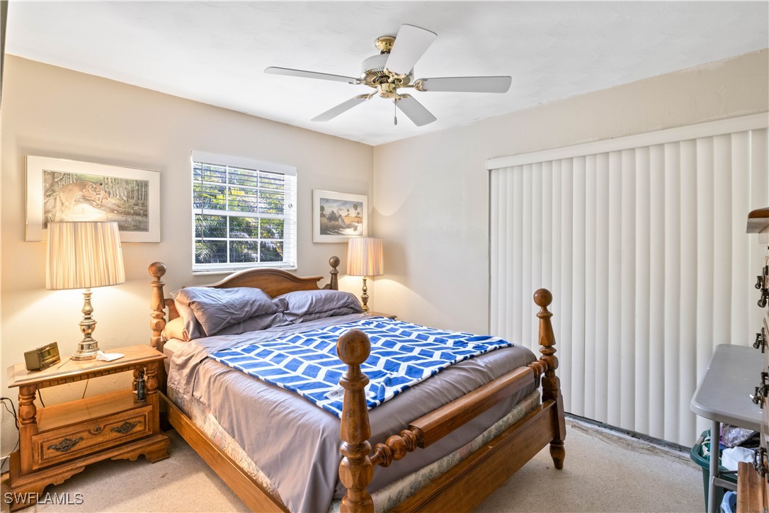 12206 Boat Shell Drive Matlacha Isles, FL 33991 - Photo 20 of 50 a bedroom with a bed and a window