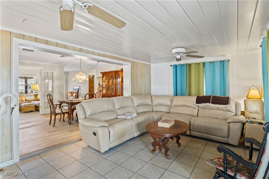 12206 Boat Shell Drive Matlacha Isles, FL 33991 - Photo 25 of 50 a living room with furniture and wooden floor