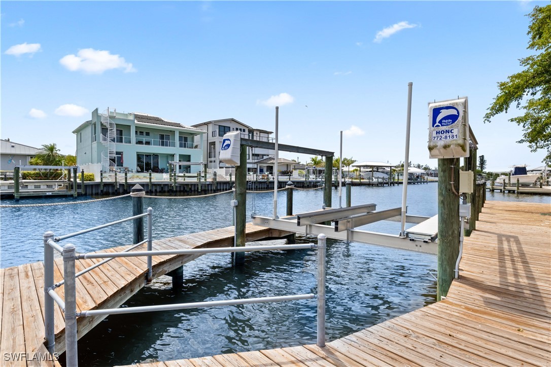 12206 Boat Shell Drive Matlacha Isles, FL 33991 - Photo 41 of 50 a view of a patio with swimming pool
