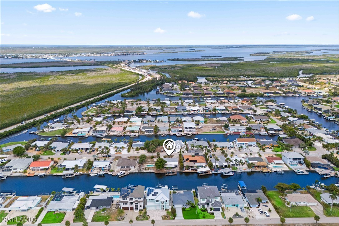 12206 Boat Shell Drive Matlacha Isles, FL 33991 - Photo 49 of 50 a view of a city with an ocean