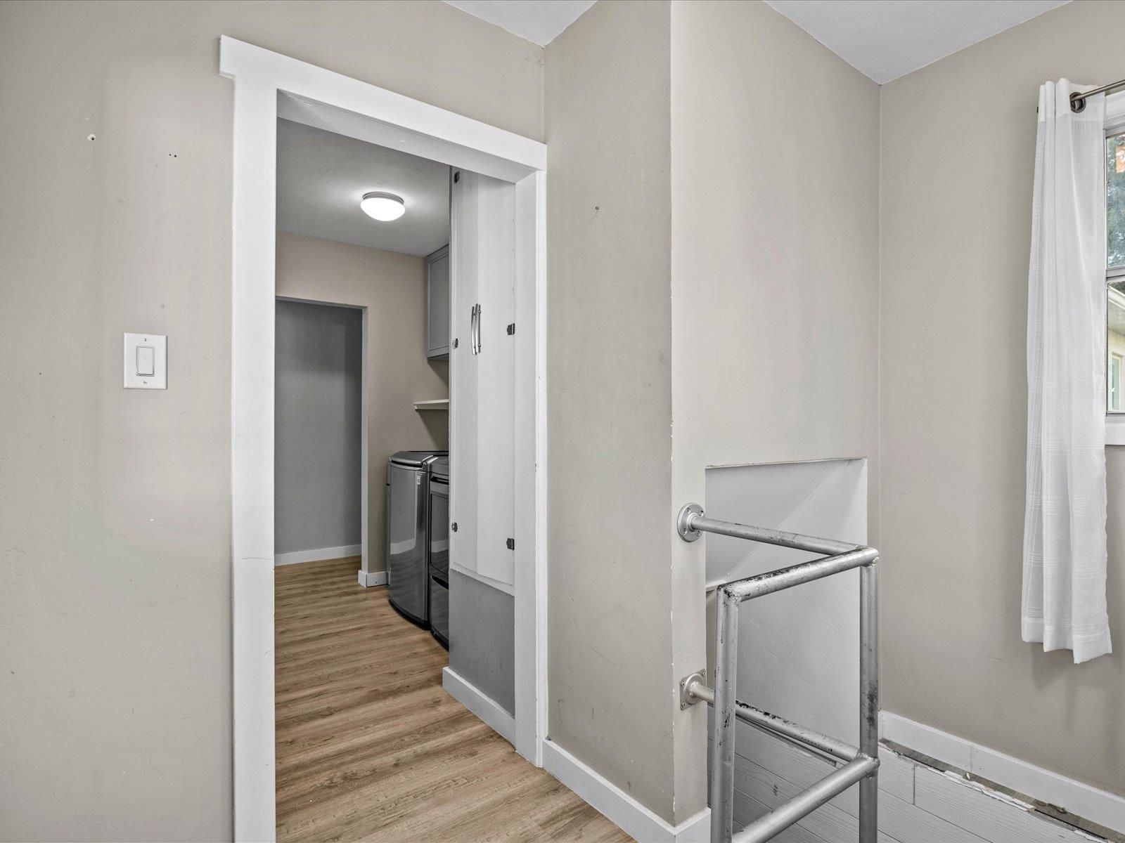 276 29 Road Grand Junction, CO 81503 - Photo 23 of 30 a view of a hallway with wooden floor and staircase