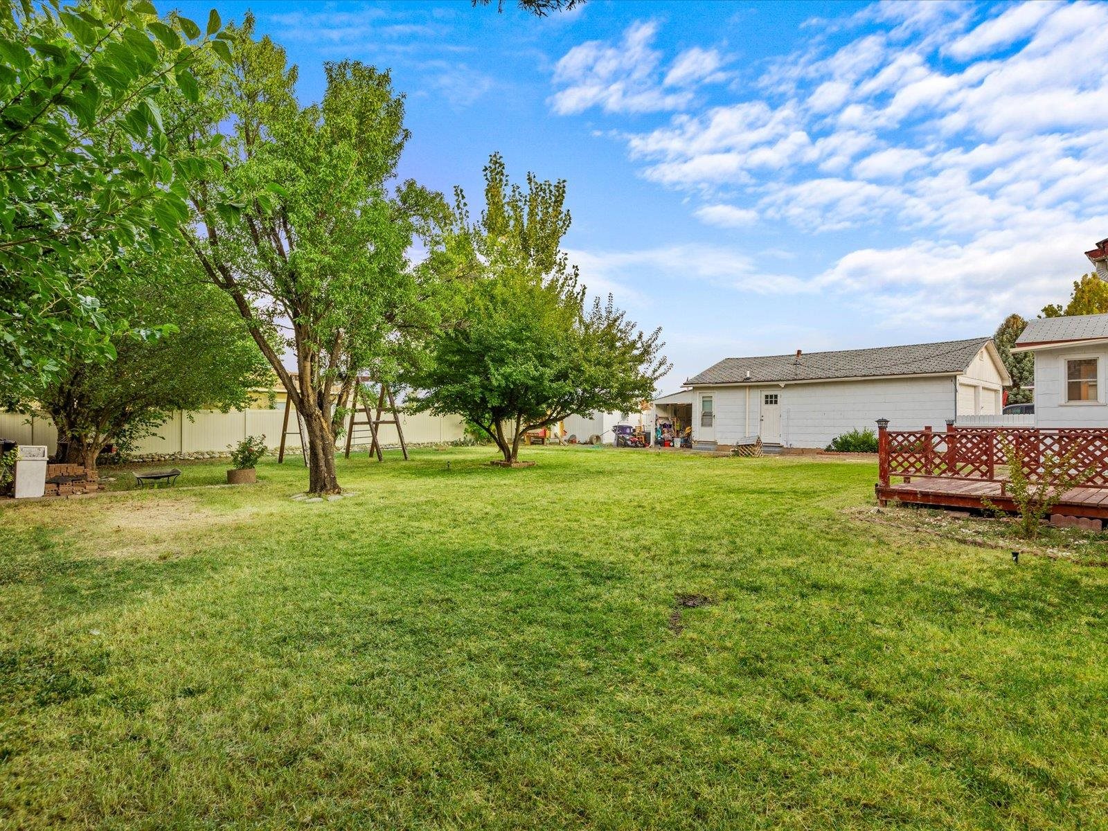 276 29 Road Grand Junction, CO 81503 - Photo 26 of 30 a view of yard with swimming pool and trees