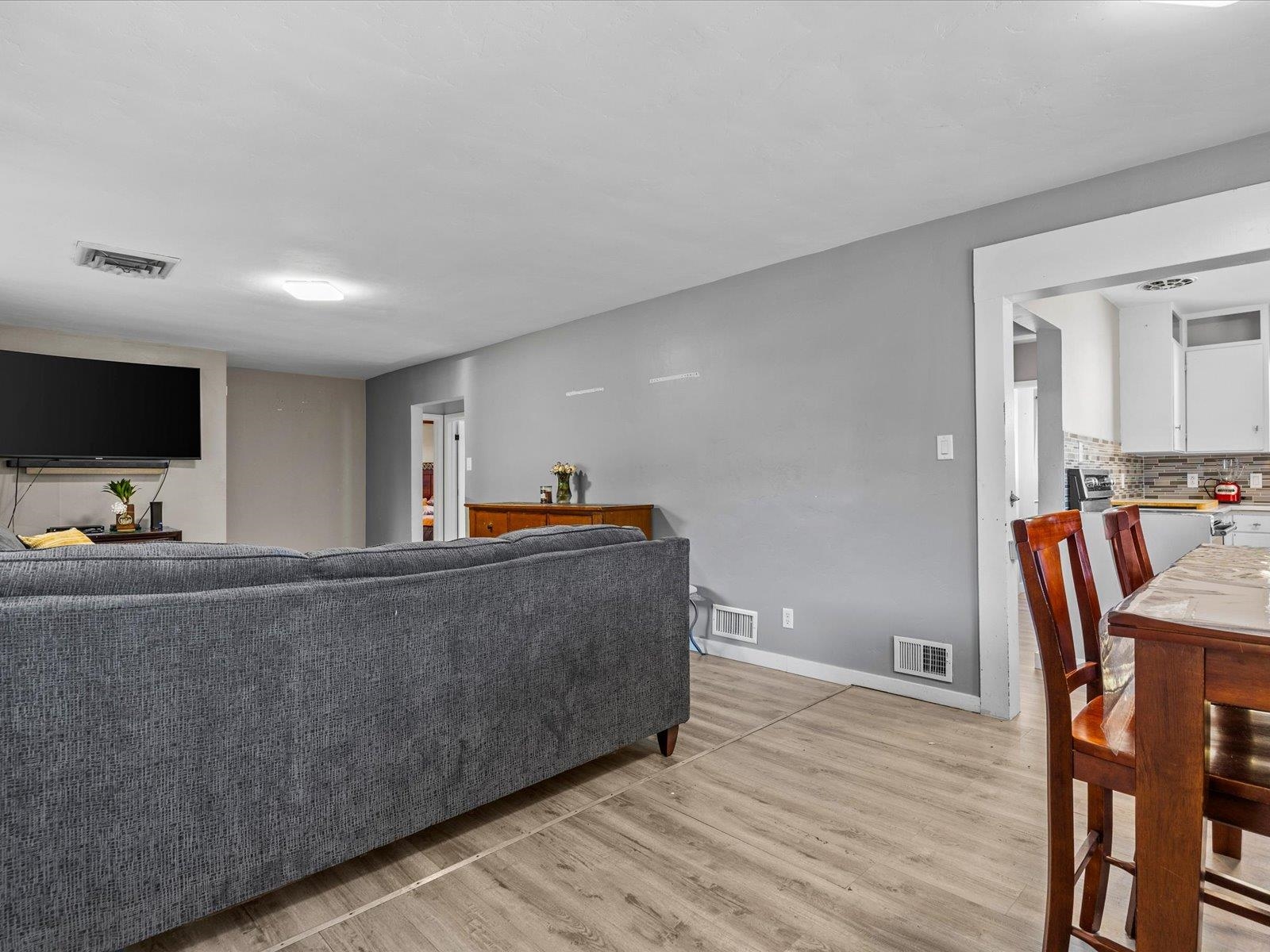 276 29 Road Grand Junction, CO 81503 - Photo 10 of 30 a living room with furniture and a flat screen tv