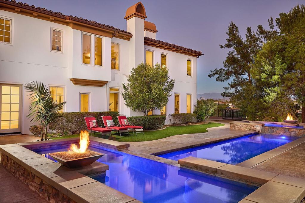 a view of a house with swimming pool