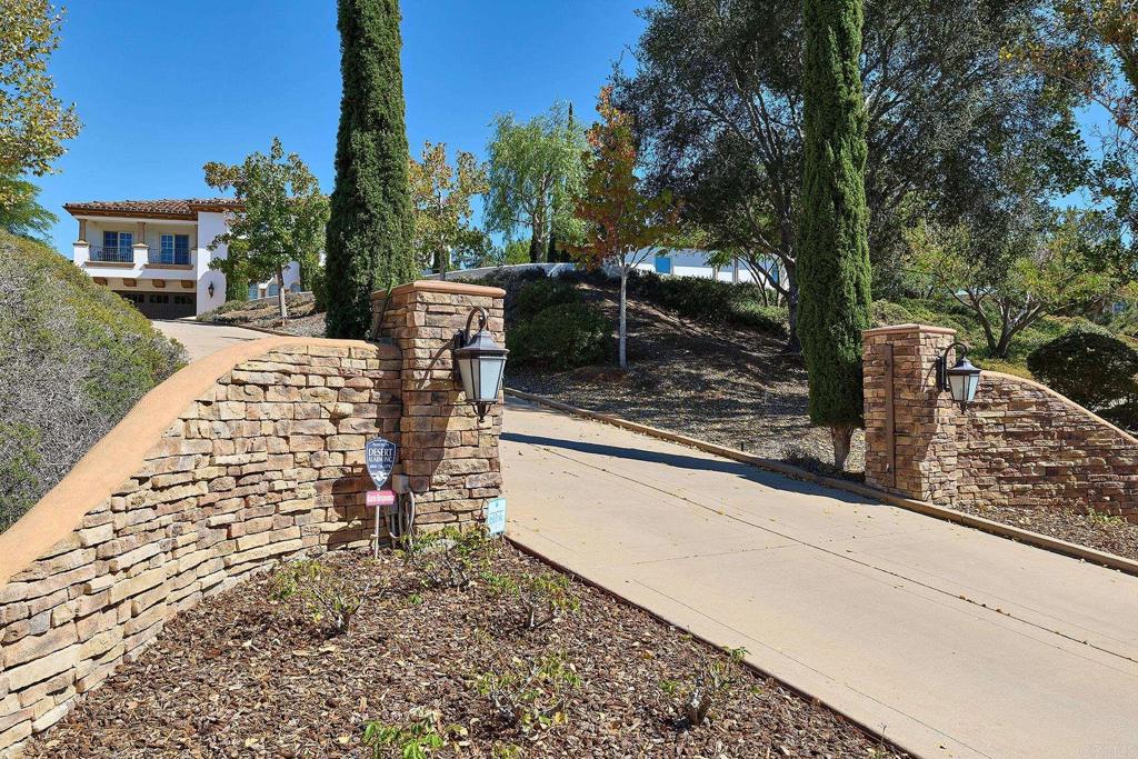 4216 Bridlewood Road Fallbrook, CA 92028 - Photo 12 of 71 a view of a patio with two chairs and a table