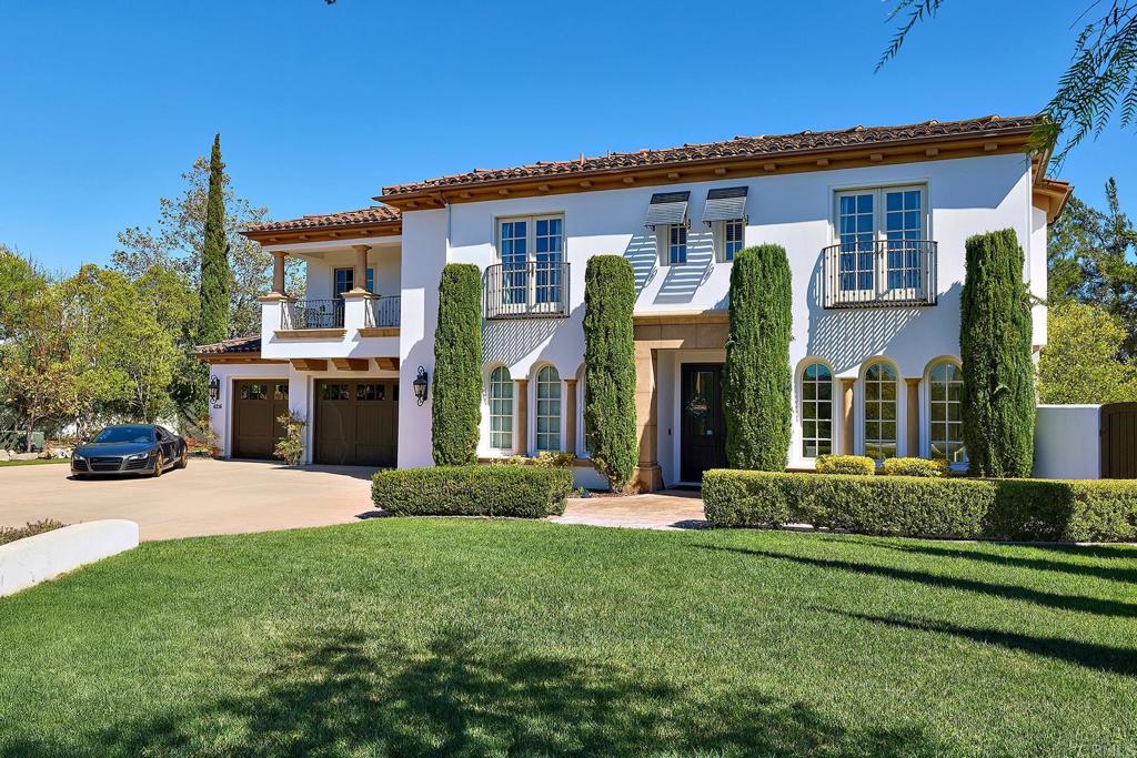 4216 Bridlewood Road Fallbrook, CA 92028 - Photo 14 of 71 a front view of a house with a yard and potted plants