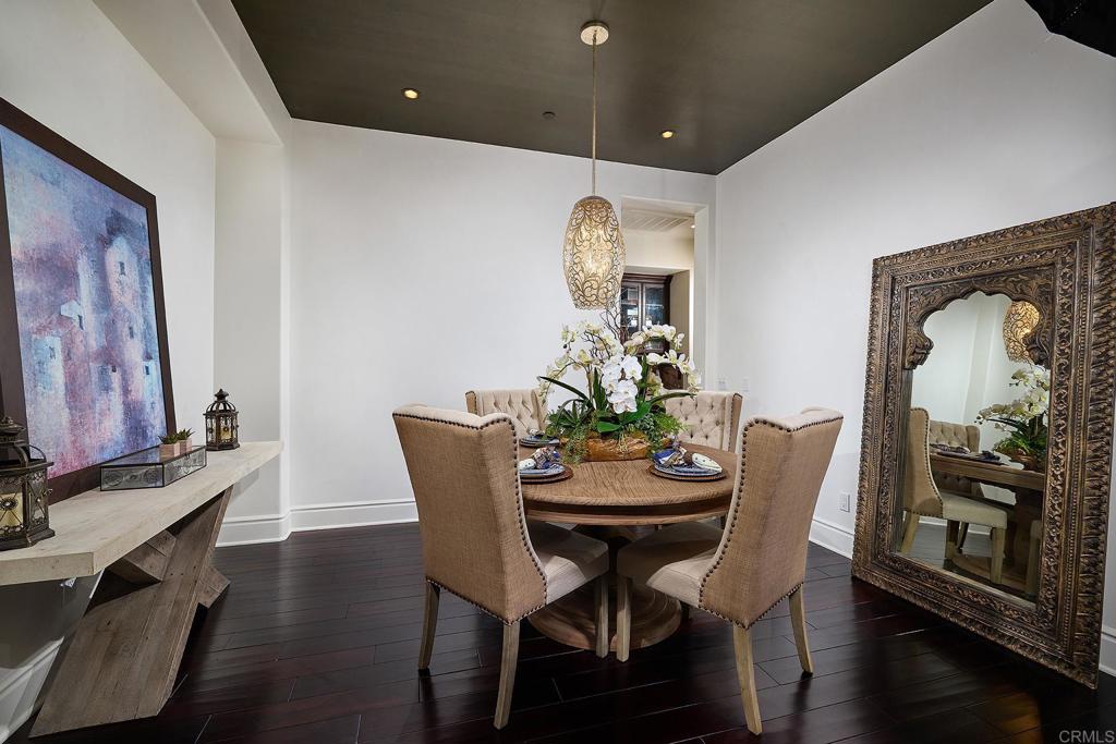 4216 Bridlewood Road Fallbrook, CA 92028 - Photo 20 of 71 a view of a dining room with furniture and wooden floor