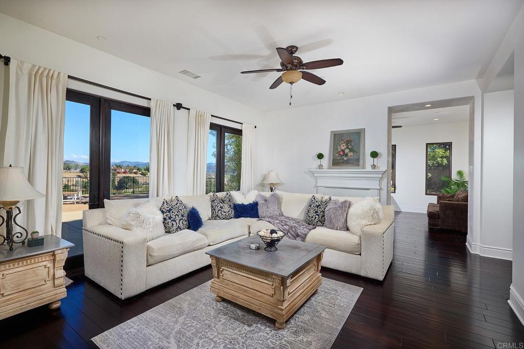 4216 Bridlewood Road Fallbrook, CA 92028 - Photo 24 of 71 a living room with furniture and a large window