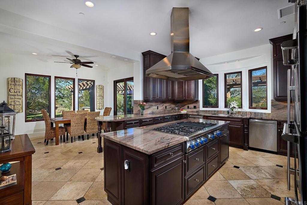 4216 Bridlewood Road Fallbrook, CA 92028 - Photo 27 of 71 a kitchen with a stove top oven stove and a sink