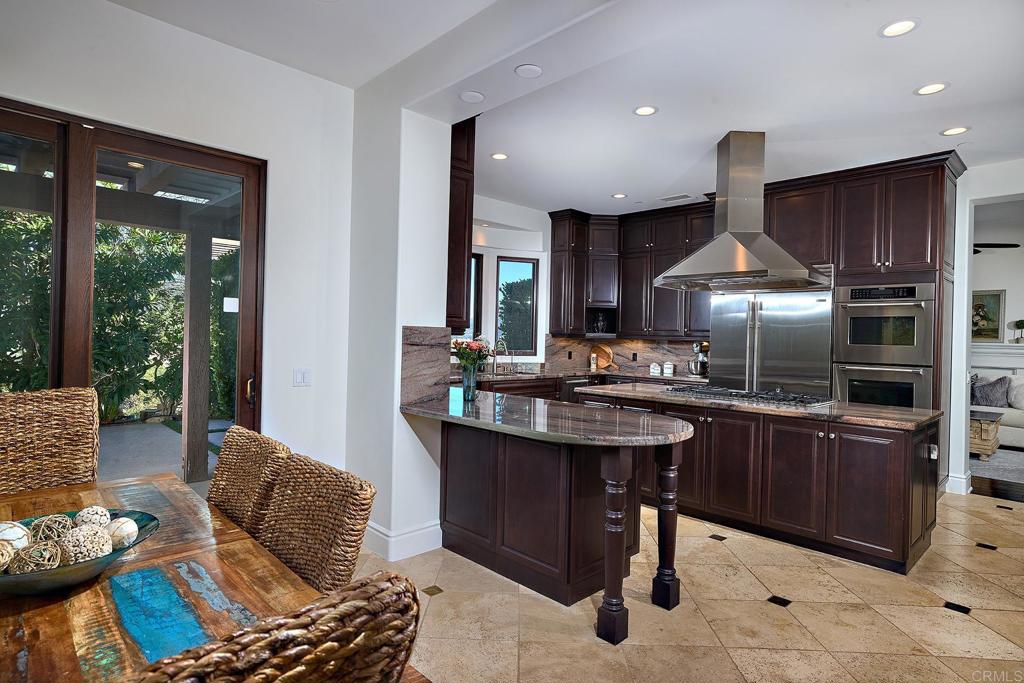 4216 Bridlewood Road Fallbrook, CA 92028 - Photo 29 of 71 a kitchen with a stove a sink and a refrigerator