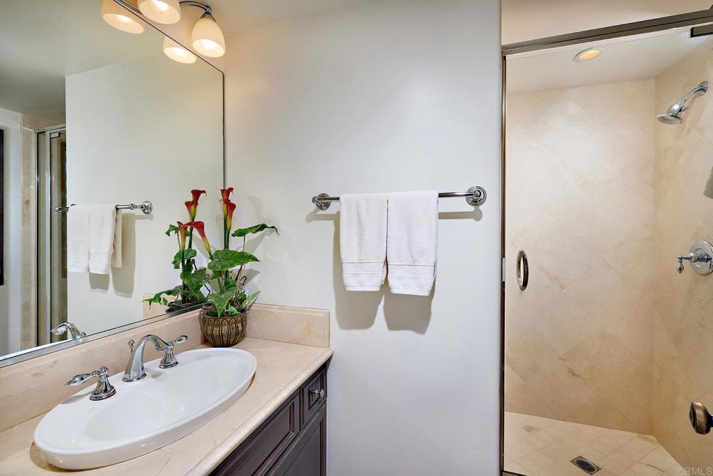 4216 Bridlewood Road Fallbrook, CA 92028 - Photo 32 of 71 a bathroom with a sink and a mirror