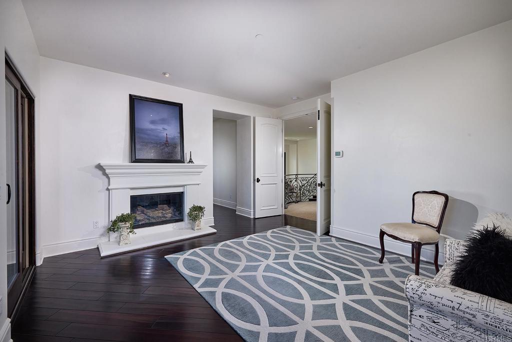 4216 Bridlewood Road Fallbrook, CA 92028 - Photo 35 of 71 a bedroom with a bed and a fireplace