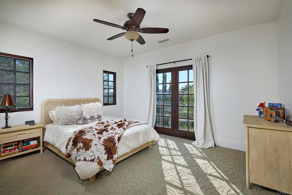 4216 Bridlewood Road Fallbrook, CA 92028 - Photo 40 of 71 a bedroom with a bed furniture and a window