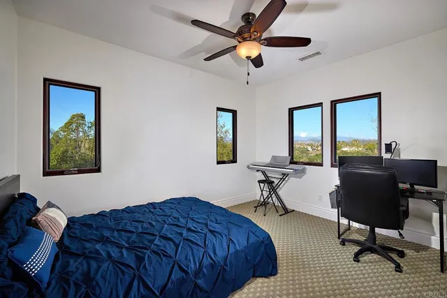 a bathroom with a sink a mirror and a shower