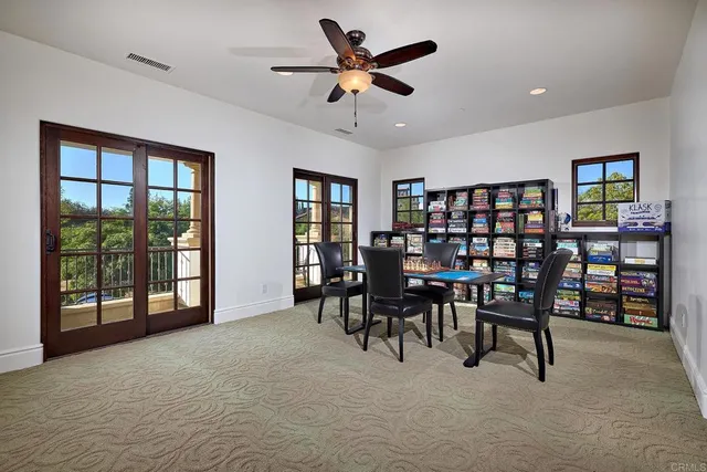 a view of backyard with outdoor seating