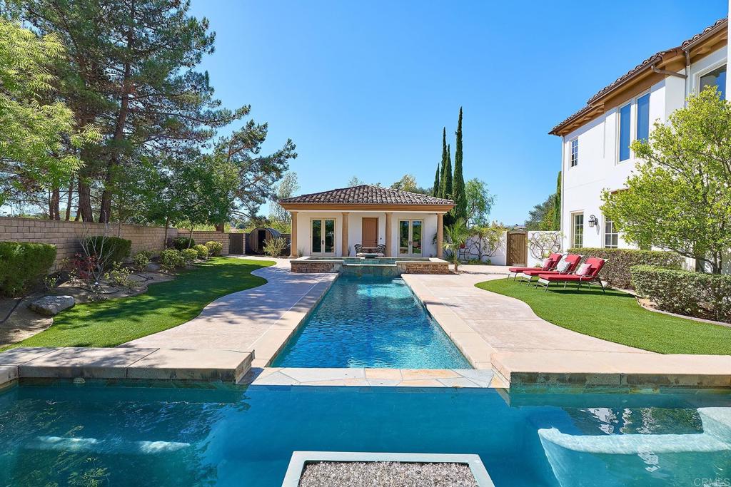 4216 Bridlewood Road Fallbrook, CA 92028 - Photo 53 of 71 a front view of a house with yard and green space