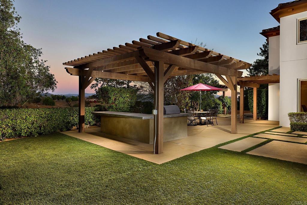 4216 Bridlewood Road Fallbrook, CA 92028 - Photo 10 of 71 a view of a patio with swimming pool table and chairs