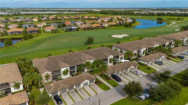 an aerial view of lake residential house with outdoor space