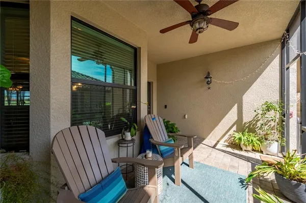 a view of balcony with furniture