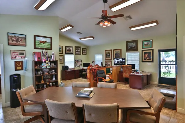 a view of a dining room with furniture
