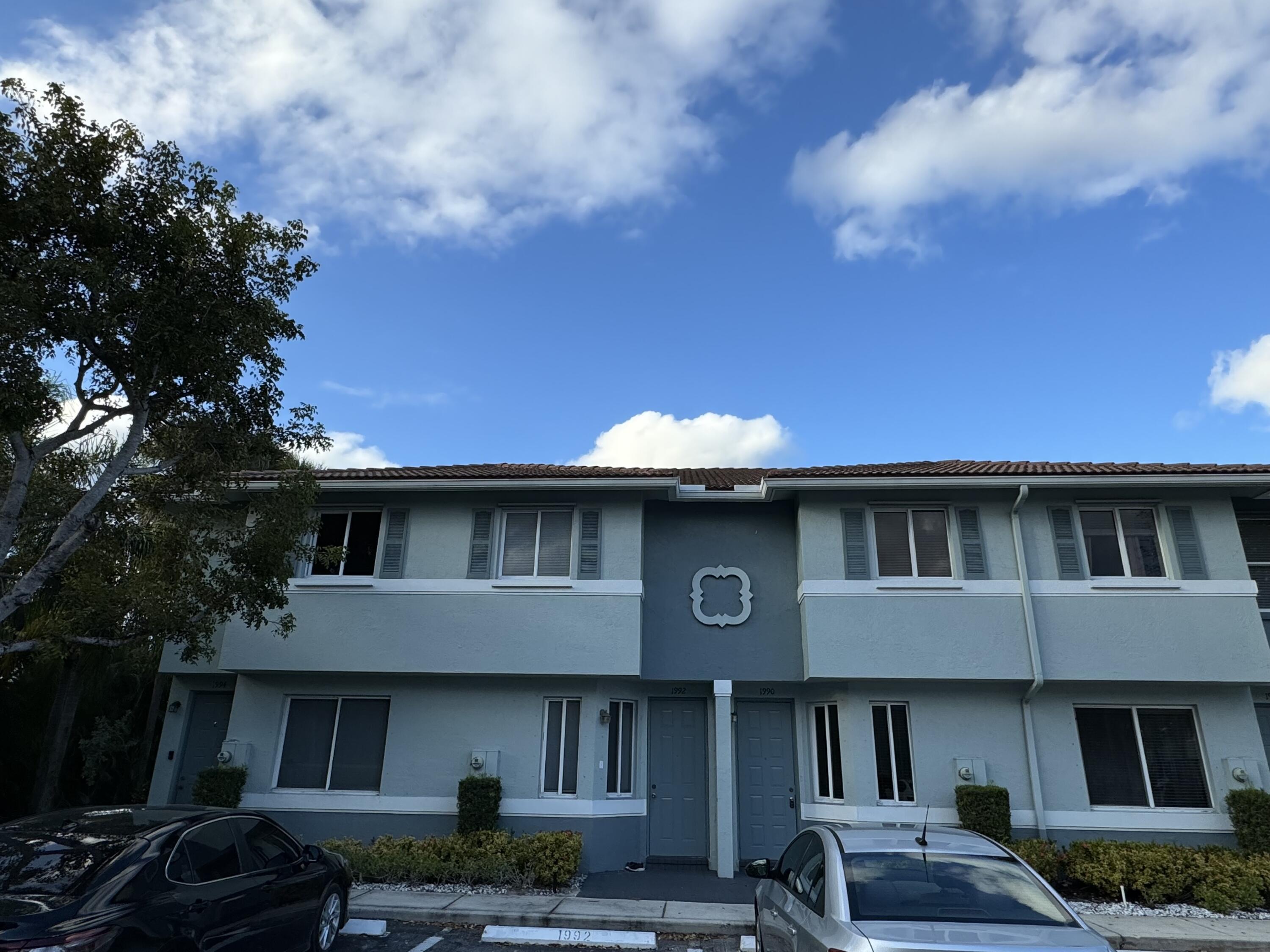 1992 Alamanda Way Riviera Beach, FL 33404 - Photo 1 of 14 Welcome home!