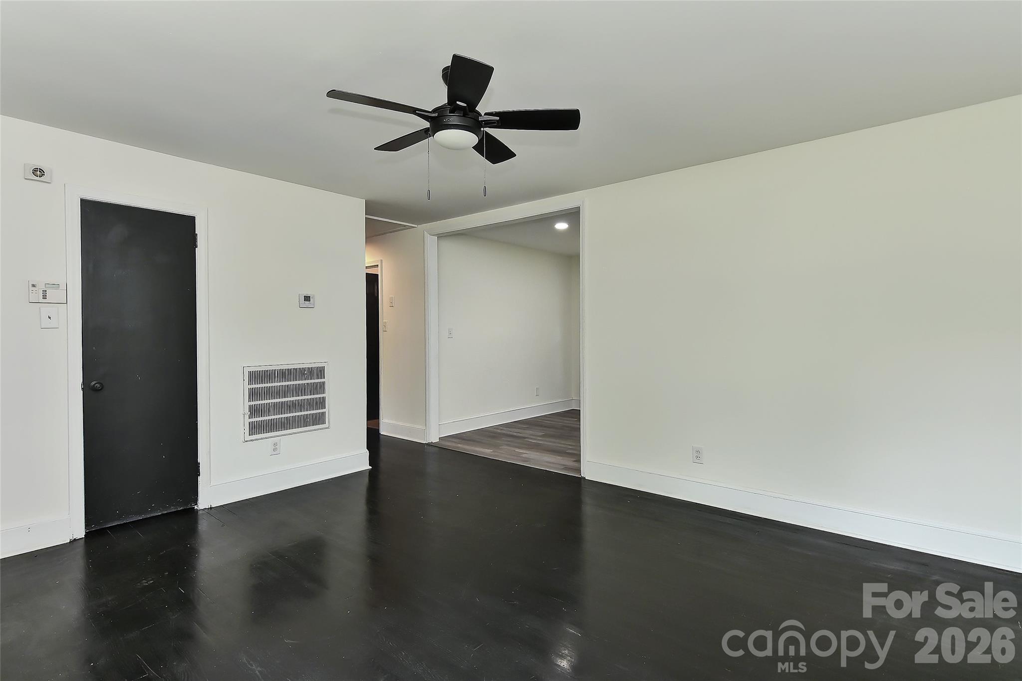 961 Clanton Road Charlotte, NC 28217 - Photo 6 of 23 wooden floor in an empty room