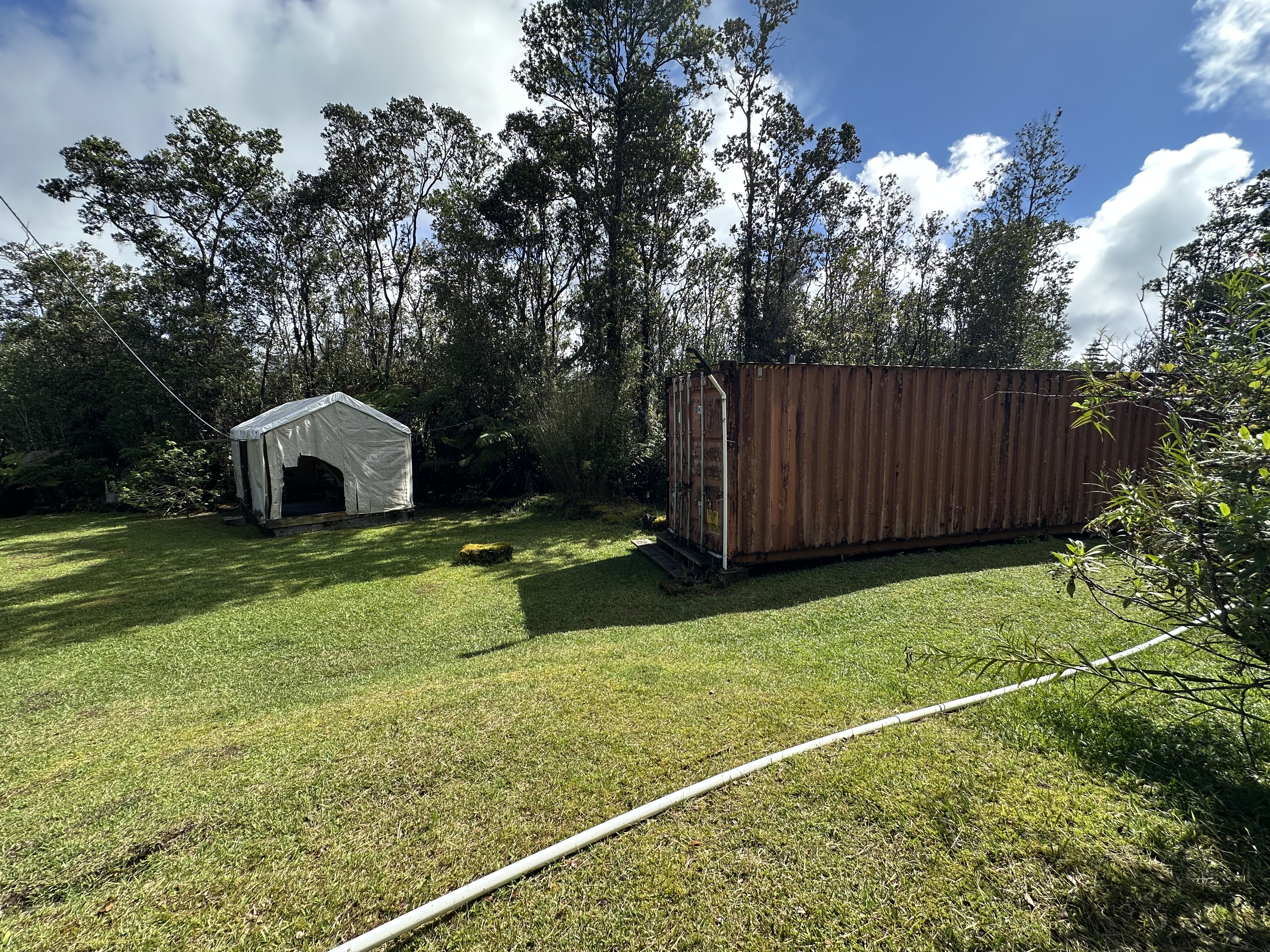 11-3003 Kahaualea Road Volcano, HI 96771 - Photo 3 of 25 a house view with a garden space