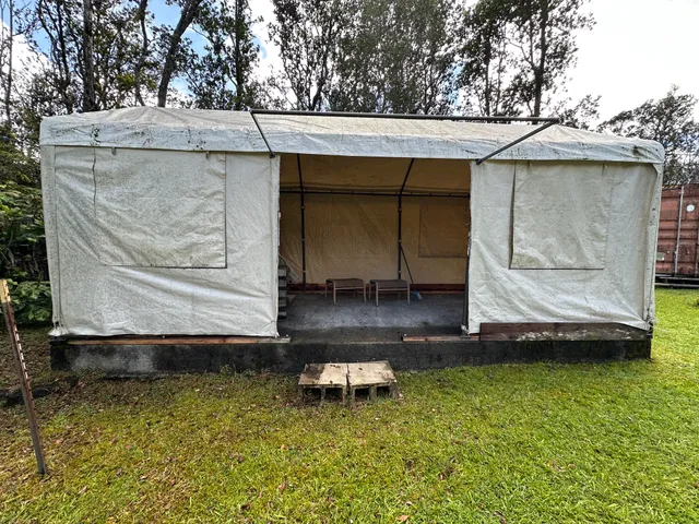 a view of a backyard with a tub