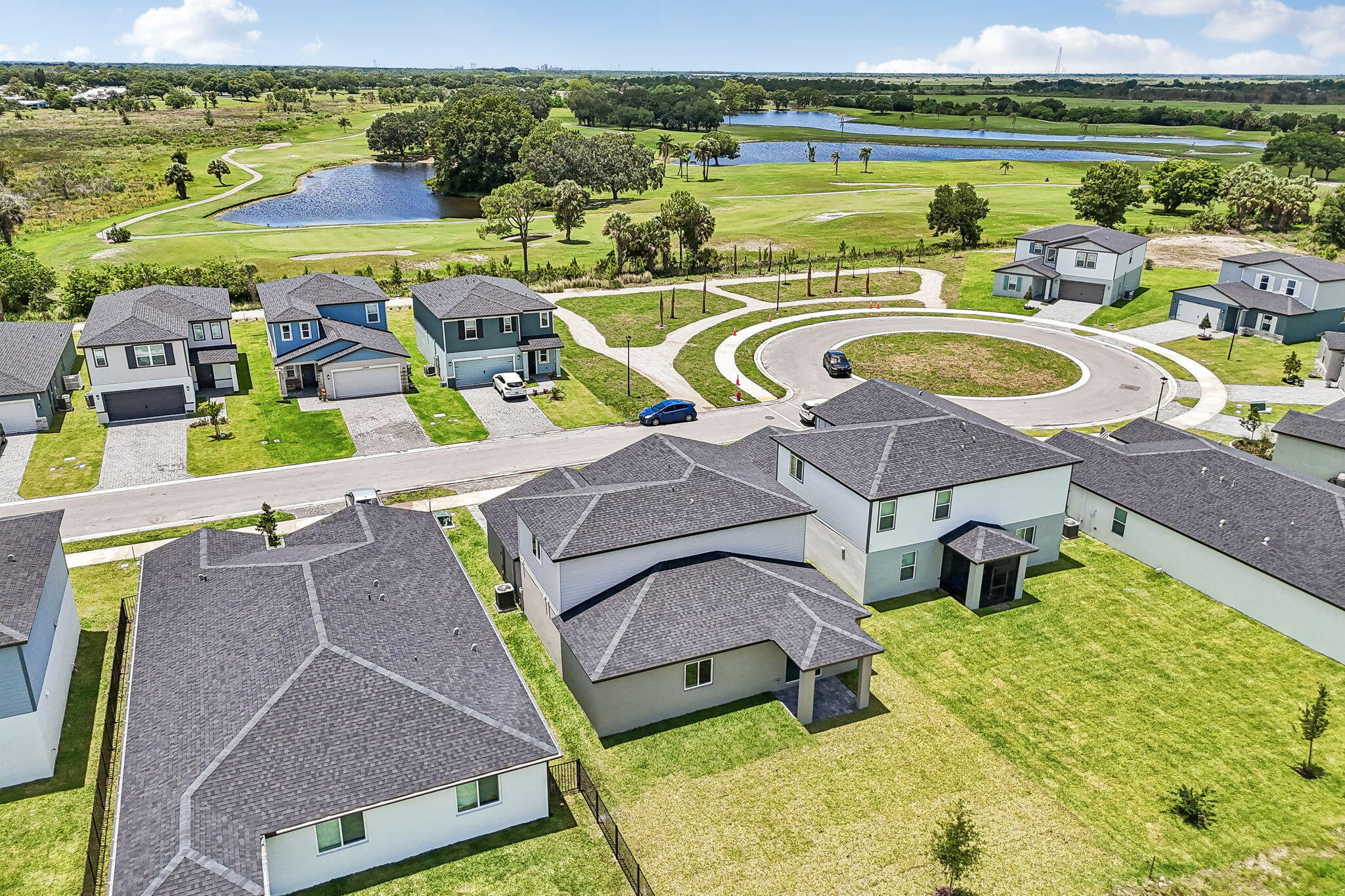 14211 Southwest New Dawn Road Indiantown, FL 34956 - Photo 35 of 37 an aerial view of a house with a ocean view