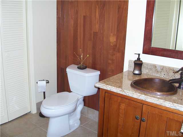 6904 Brecken Ridge Avenue Raleigh, NC 27615 - Photo 12 of 25 Near the Family Room is the updated guest half bath.