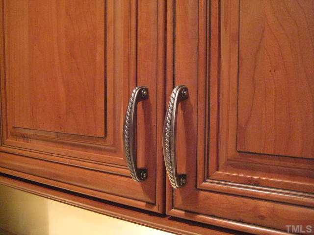 6904 Brecken Ridge Avenue Raleigh, NC 27615 - Photo 5 of 25 Even the hardward on the cabinets and soft close drawers are of the highest quality.