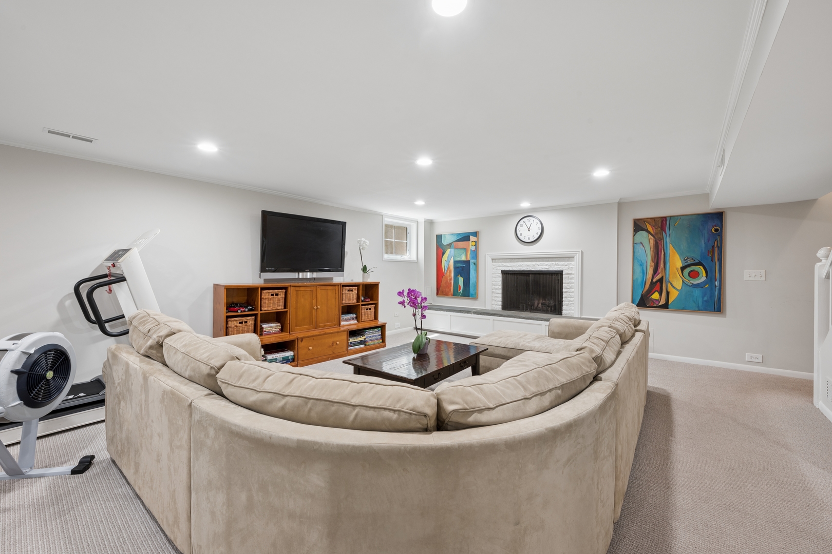 936 Sunset Road Winnetka, IL 60093 - Photo 40 of 50 a living room with furniture and a flat screen tv