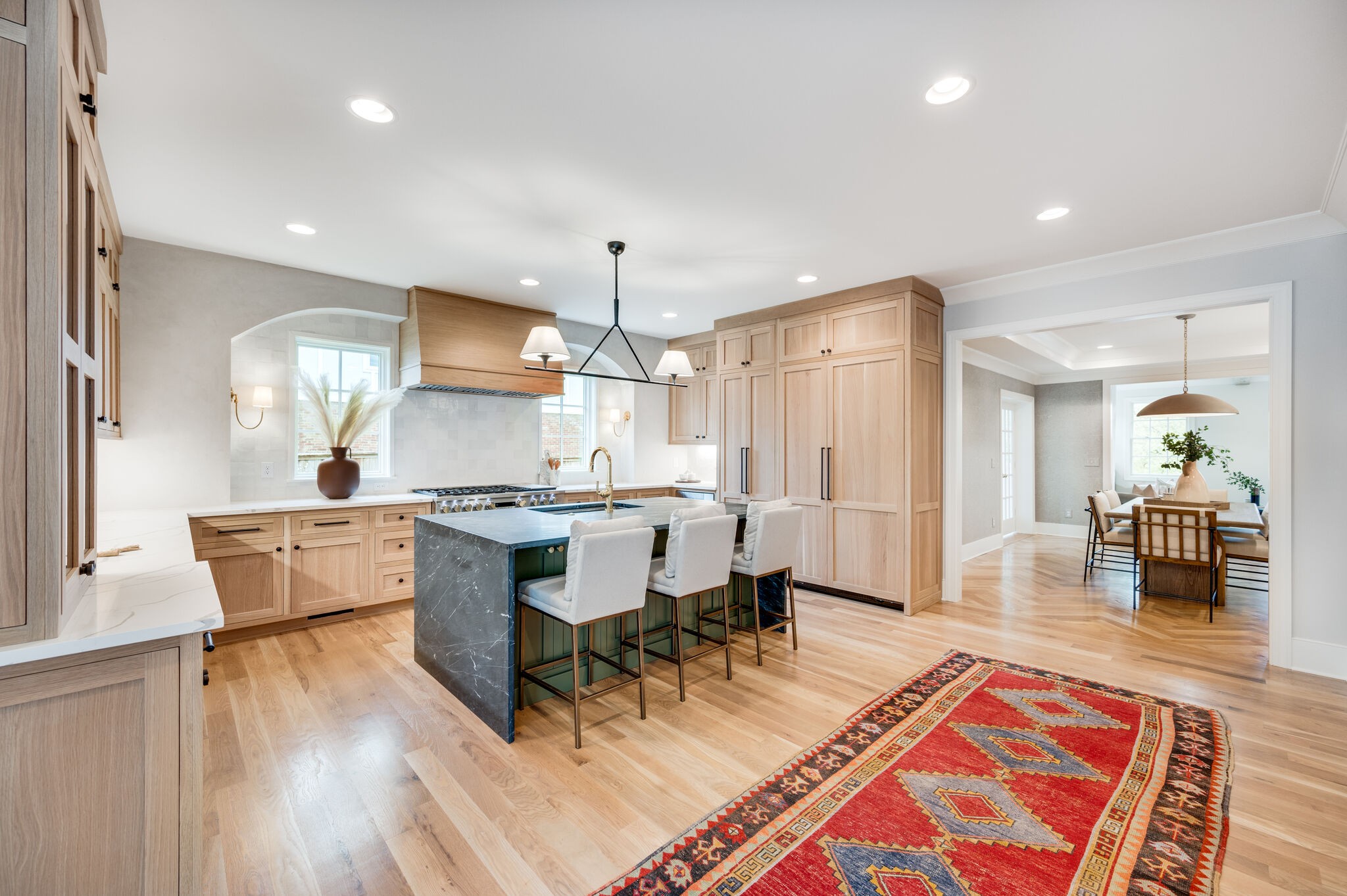 1818 Cedar Lane Nashville, TN 37212 - Photo 17 of 70 a large white kitchen with a table and chairs