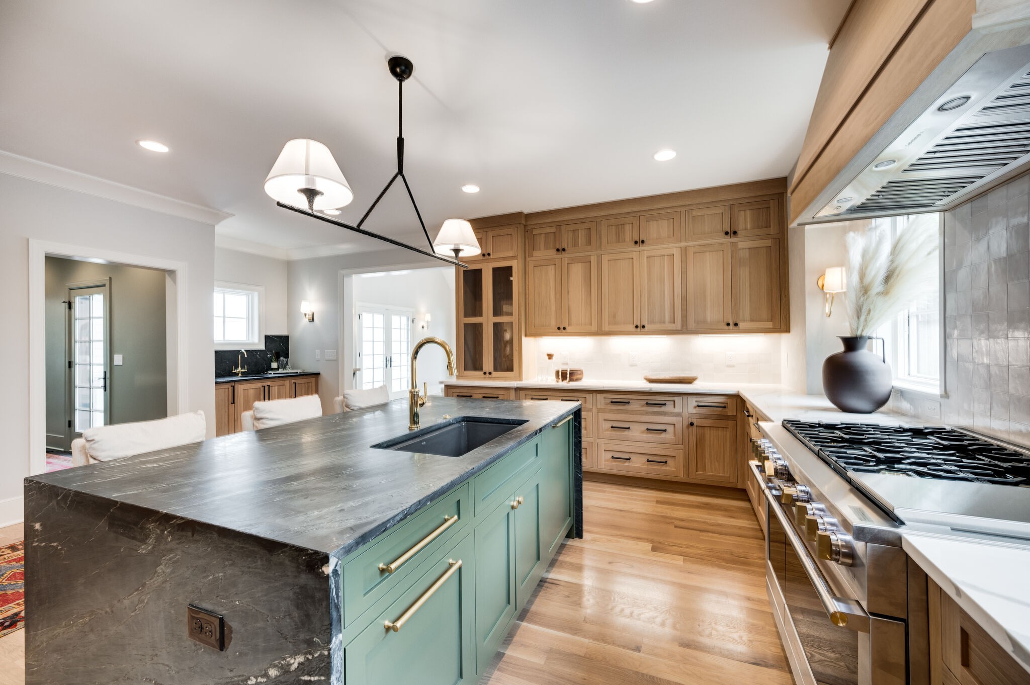 1818 Cedar Lane Nashville, TN 37212 - Photo 26 of 70 a kitchen with stove cabinets and dining table
