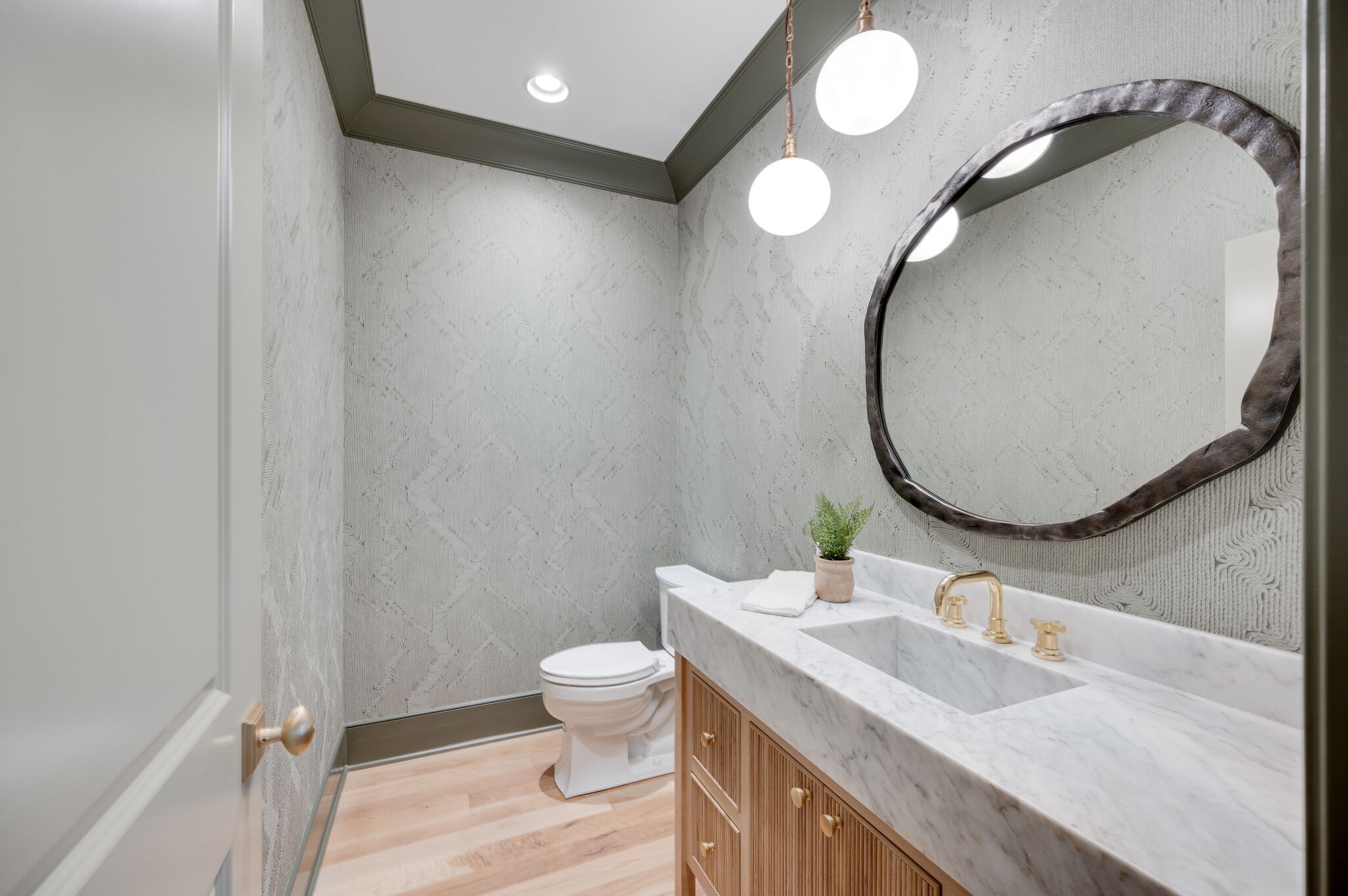 1818 Cedar Lane Nashville, TN 37212 - Photo 34 of 70 a bathroom with a sink and a mirror