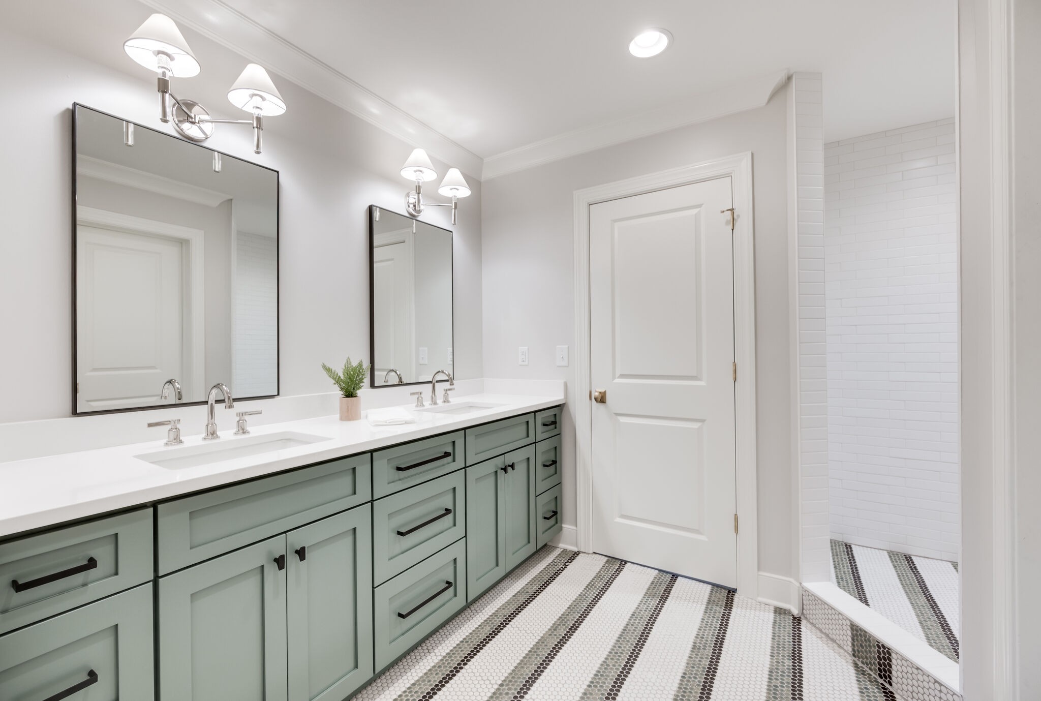 1818 Cedar Lane Nashville, TN 37212 - Photo 55 of 70 a spacious bathroom with a double vanity sink a mirror and a shower