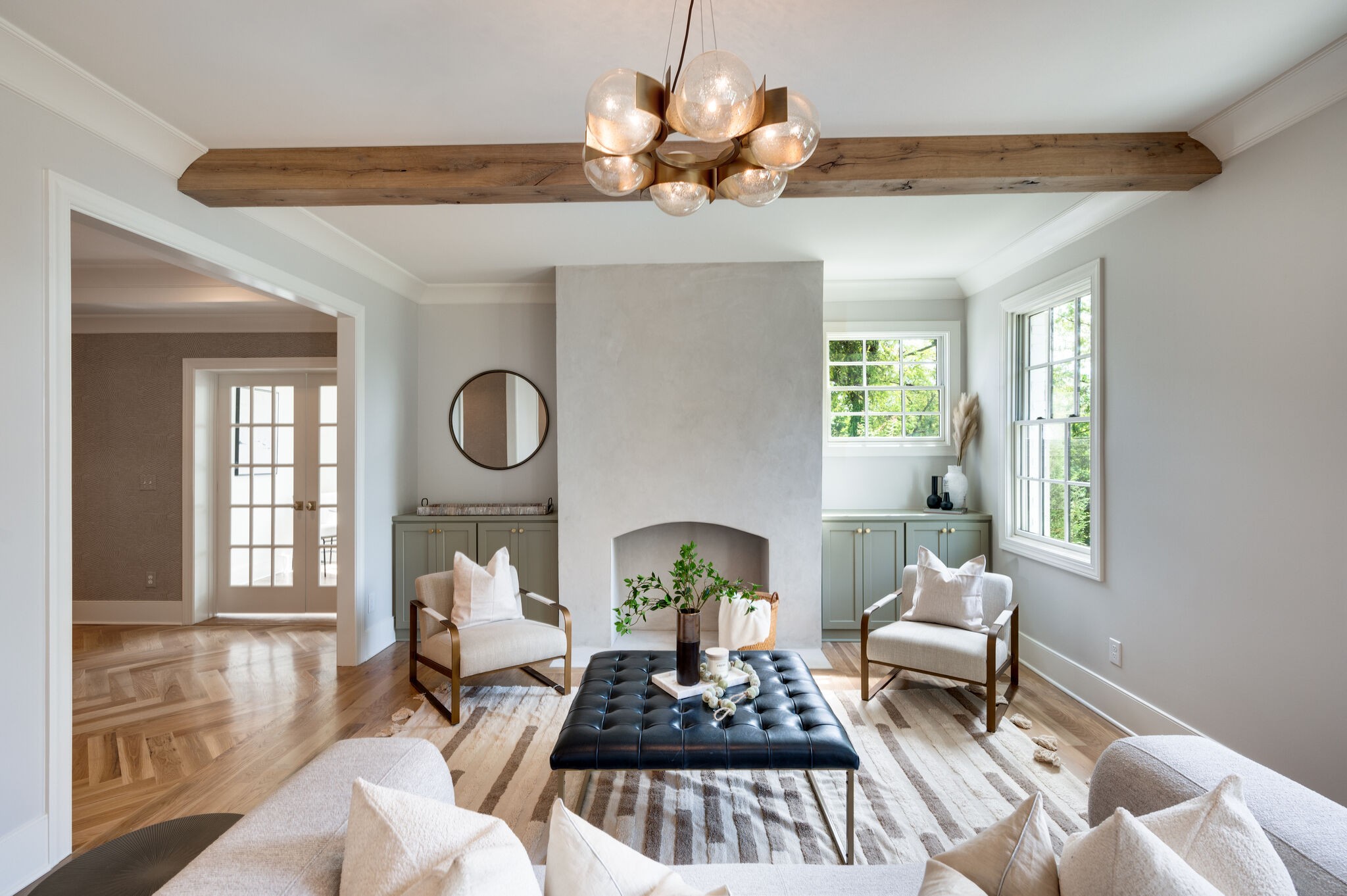 1818 Cedar Lane Nashville, TN 37212 - Photo 9 of 70 a living room with furniture a chandelier and a window