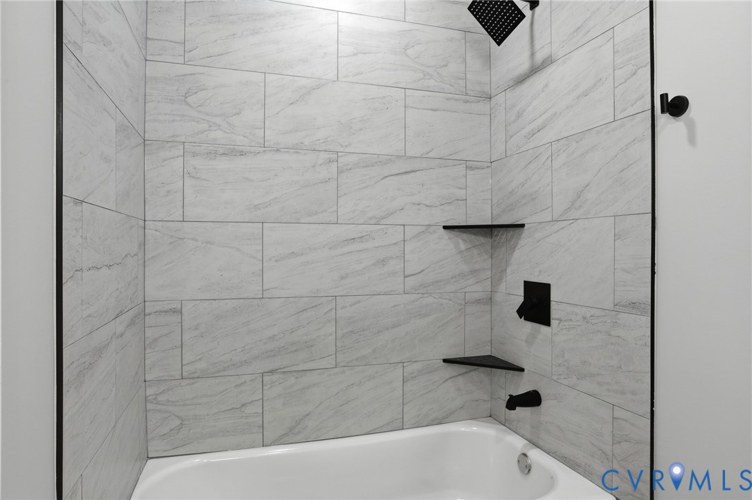 3490 Willow Brook Road Bumpass, VA 23024 - Photo 25 of 29 a bathroom with a bathtub